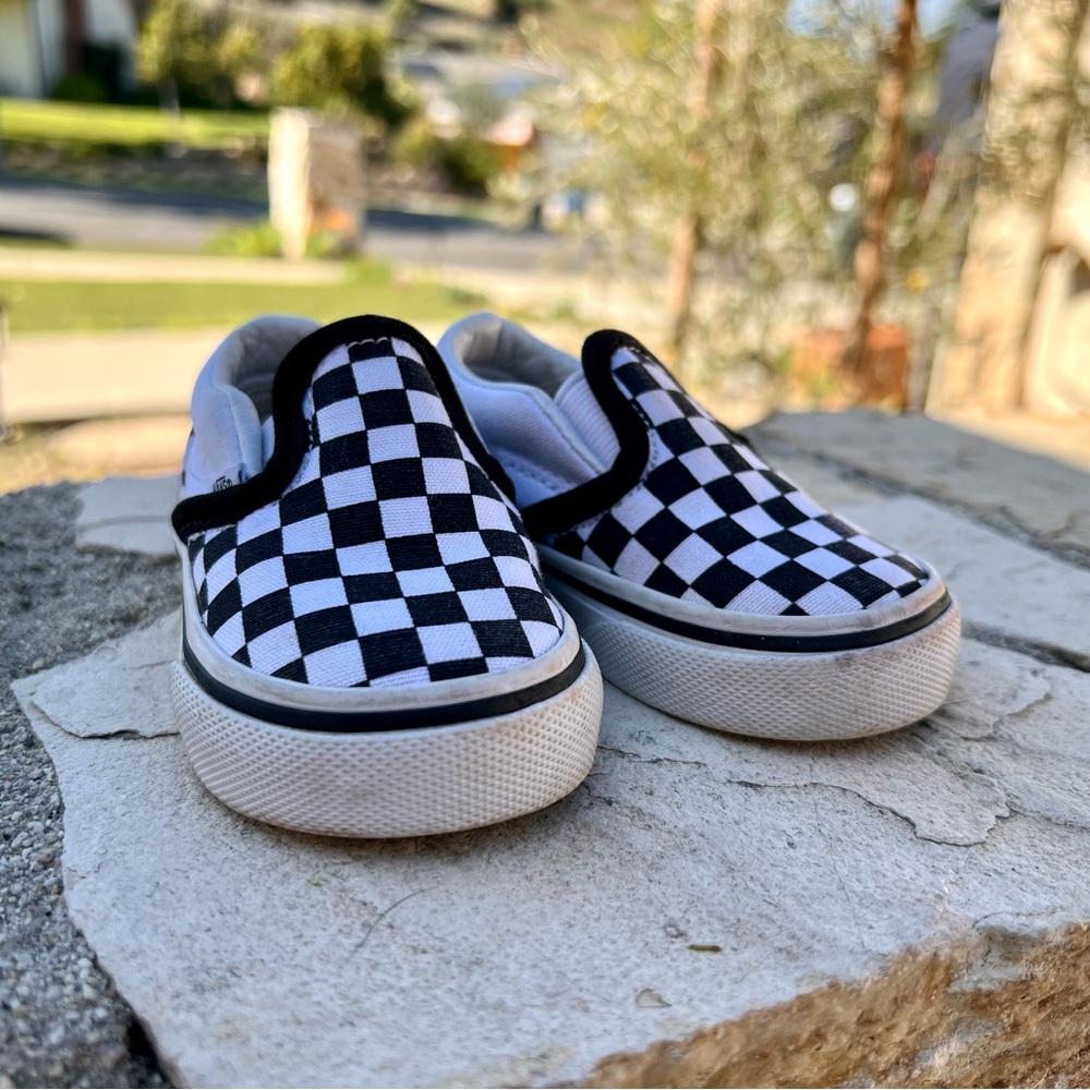 Vans Black and White Checkerboard Slip-On Sneakers